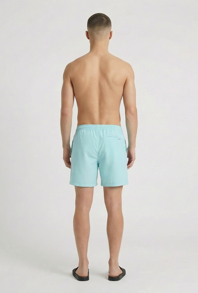 Back image of a model wearing Deep sharky swimshorts in mint, by brand Deep
