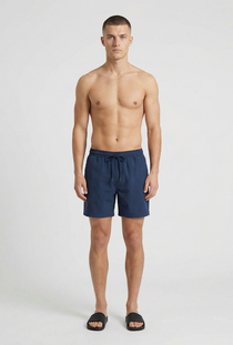 Front image of a model wearing the Deep sharky swimshorts in navy, by brand Deep