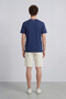Back image of a model wearing the Deep troy s/s tshirt in navy, by brand Deep