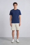 Front image of a model wearing Deep troy s/s tshirt in navy, by brand Deep