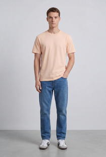 Front image of a model wearing the Deep troy tshirt in peach, by brand Deep