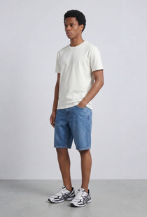 Front image of a model wearing the Deep troy tshirt in white, by brand Deep