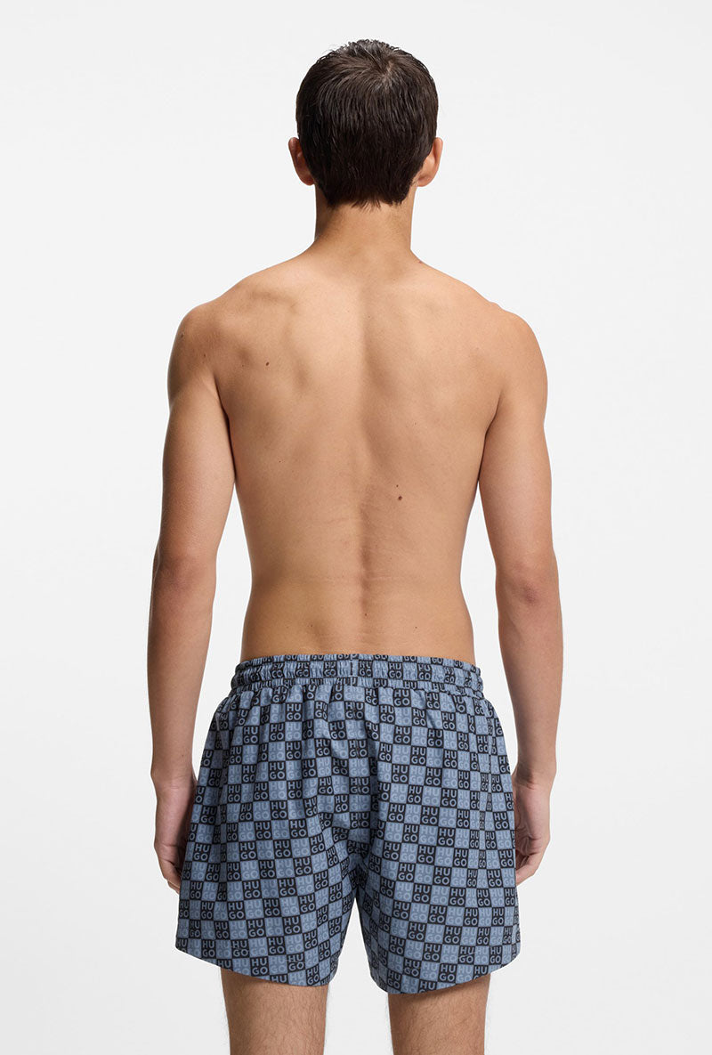 Back image of a model wearing Hugo aaron swimshorts in navy, by brand Hugo