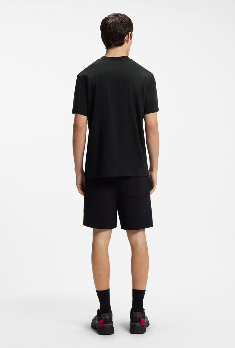 Back image of a model wearing Dikerd t in black, by brand Hugo