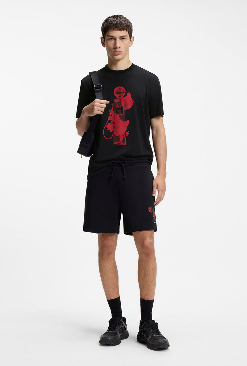 Front image of a model wearing Dikerd t in black, by brand Hugo