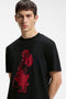 Front image of a model wearing the Dikerd t in black, by brand Hugo