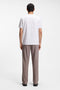 Back image of a model wearing the Discorb t in white, by brand Hugo