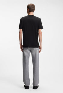 Back image of a model wearing the Dostino t in black, by brand Hugo