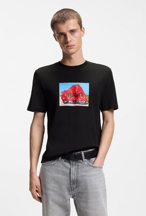 Front image of a model wearing Dostino t in black, by brand Hugo