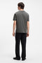 Back image of a model wearing the Dostino t in dark grey, by brand Hugo