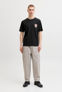 Image of MONTAUK CHESTIE SHORTSLEEVE TEE in black, by brand JACK&JONES