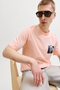 Front image of the Montauk chestie shortsleeve tee in peach, by brand Jack&jones