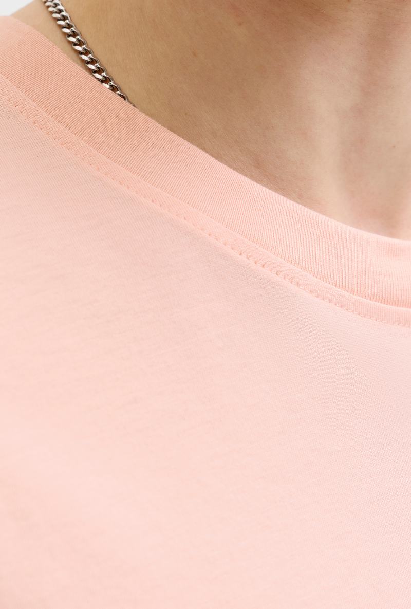 Front image of Montauk chestie shortsleeve tee in peach, by brand Jack&jones
