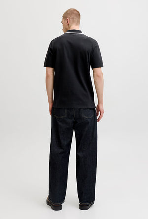Back image of a model wearing the Blaze s/s polo in black, by brand Jack&jones