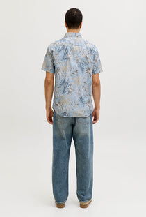 Back image of a model wearing the Honolulu aop ss shirt in blue, by brand Jack&jones