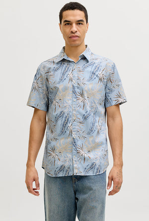Front image of a model wearing the Honolulu aop ss shirt in blue, by brand Jack&jones