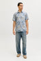 Front image of a model wearing the Honolulu aop ss shirt in blue, by brand Jack&jones