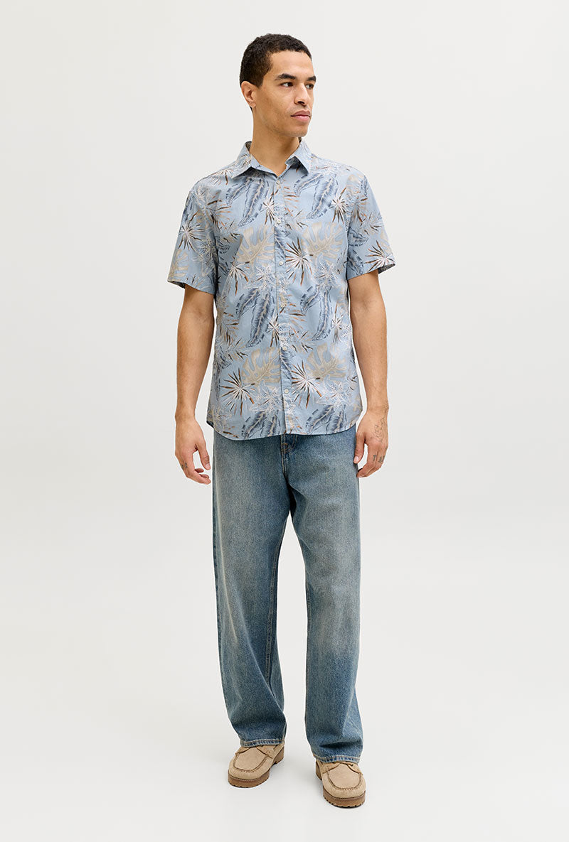 Front image of a model wearing Honolulu aop ss shirt in blue, by brand Jack&jones
