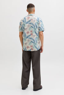 Back image of a model wearing the Honolulu aop ss shirt in off white, by brand Jack&jones