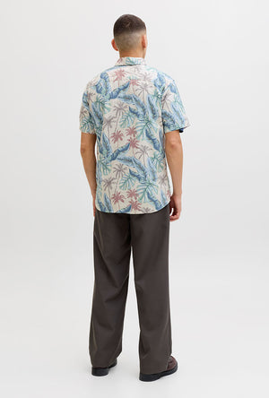 Back image of a model wearing the Honolulu aop ss shirt in off white, by brand Jack&jones