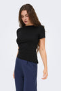 Image of CATIE S/S ASSYMETRIC TOP in black, by brand JACQUELINE DE YONG