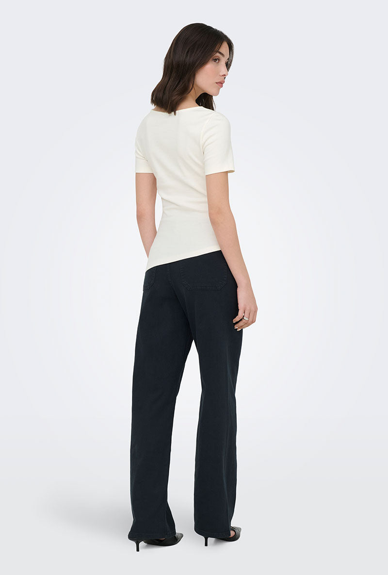 Back image of a model wearing Catie s/s assymetric top in white, by brand Jacqueline de yong