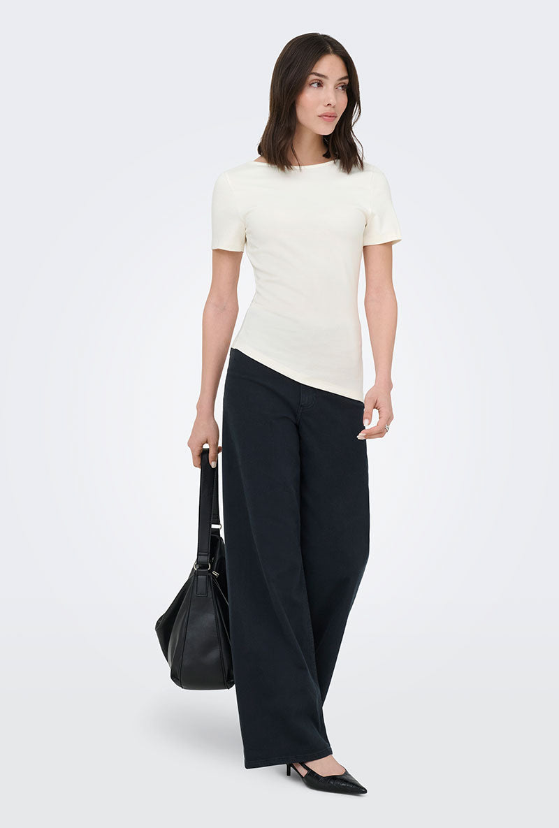 Front image of a model wearing Catie s/s assymetric top in white, by brand Jacqueline de yong