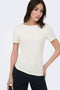 Front image of a model wearing the Catie s/s assymetric top in white, by brand Jacqueline de yong