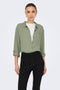Front image of a model wearing Caya linen loose l/s shirt in sage, by brand Jacqueline de yong