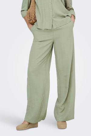 Front image of the Caya linen midwaist pants in khaki, by brand Jacqueline de yong