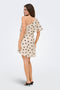 Back image of a model wearing the Fay life one shoulder drss in cream, by brand Jacqueline de yong