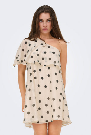 Front image of a model wearing the Fay life one shoulder drss in cream, by brand Jacqueline de yong