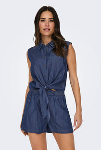 Front image of a model wearing the Kai s/l shirt in denim, by brand Jacqueline de yong