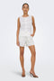 Front image of a model wearing the Nulle life shorts in off white, by brand Jacqueline de yong