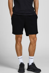 Front image of a model wearing the Gordon bradley sweat shorts in black, by brand Jack&jones