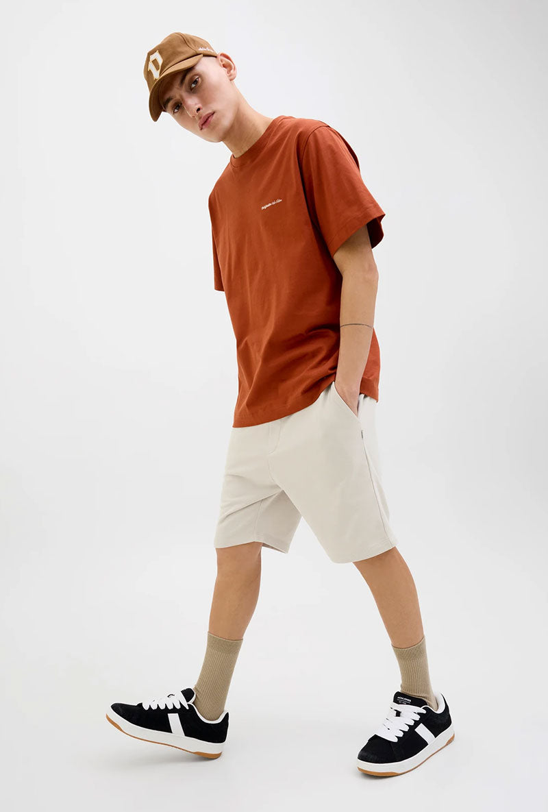 Front image of a model wearing Gordon bradley sweat shorts in stone, by brand Jack&jones
