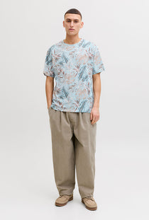 Front image of a model wearing the Honolulu aop ss tee in blue, by brand Jack&jones