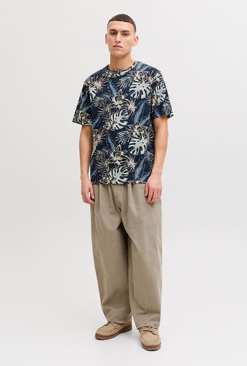 Front image of a model wearing Honolulu aop ss tee in navy, by brand Jack&jones