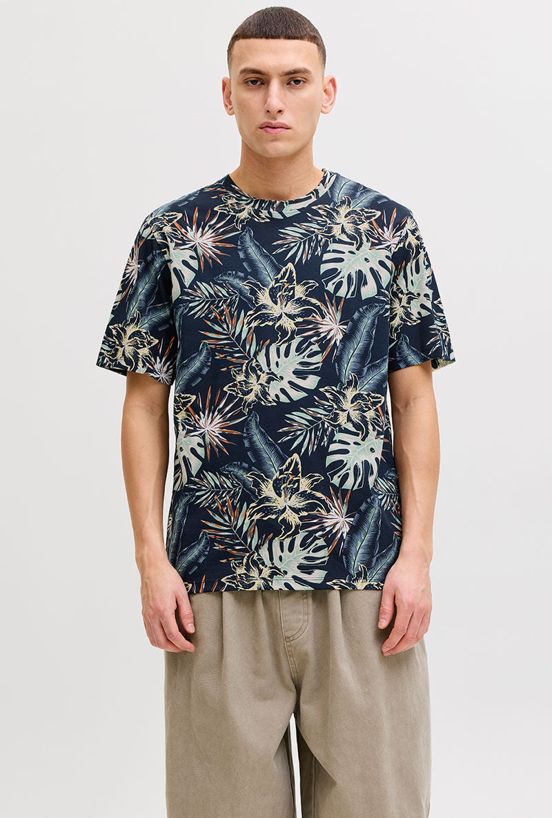 Front image of a model wearing Honolulu aop ss tee in navy, by brand Jack&jones