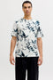 Front image of a model wearing Honolulu aop ss tee in beige, by brand Jack&jones