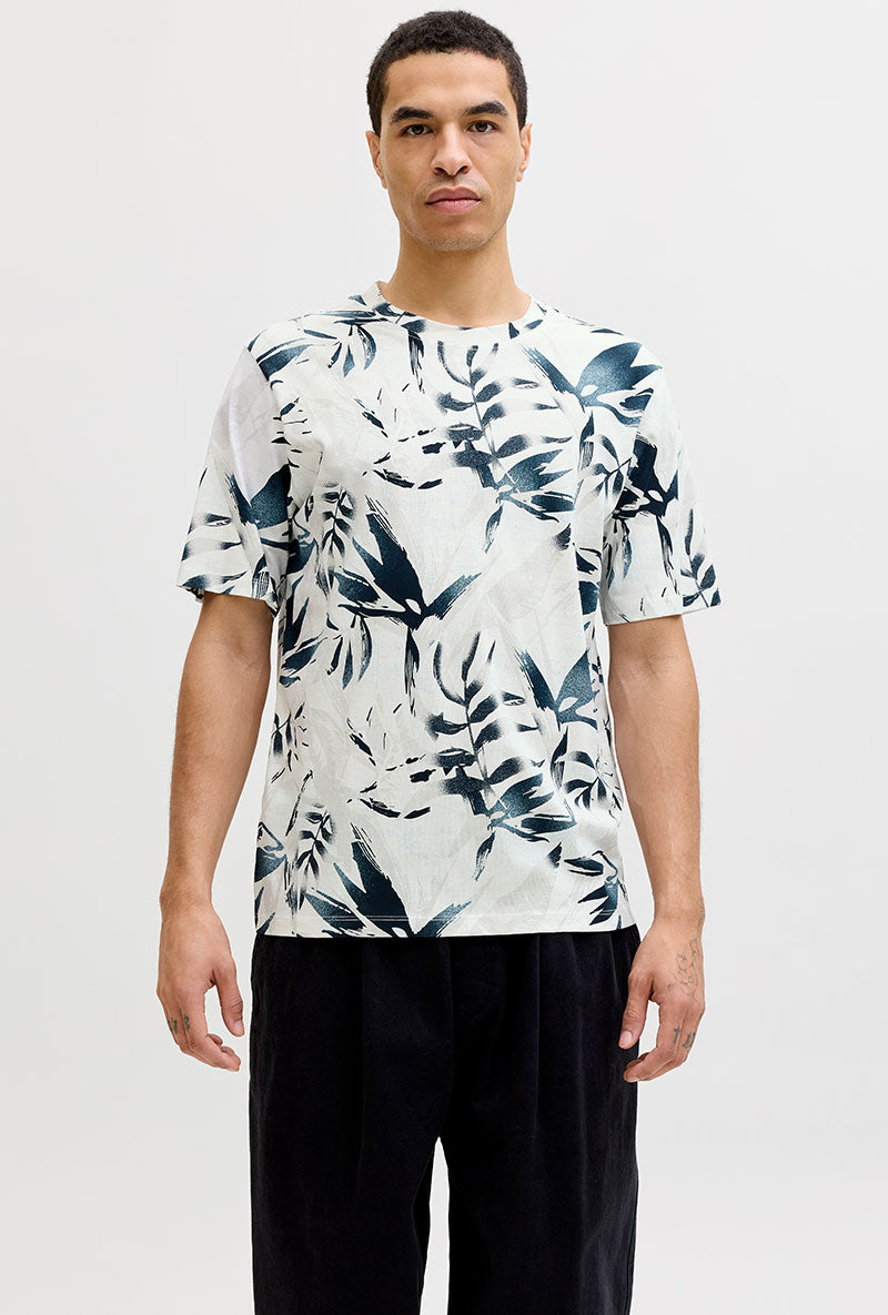 Front image of a model wearing Honolulu aop ss tee in beige, by brand Jack&jones