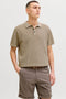 Front image of a model wearing Jess knit polo in stone, by brand Jack&jones