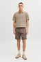 Front image of a model wearing the Jess knit polo in stone, by brand Jack&jones