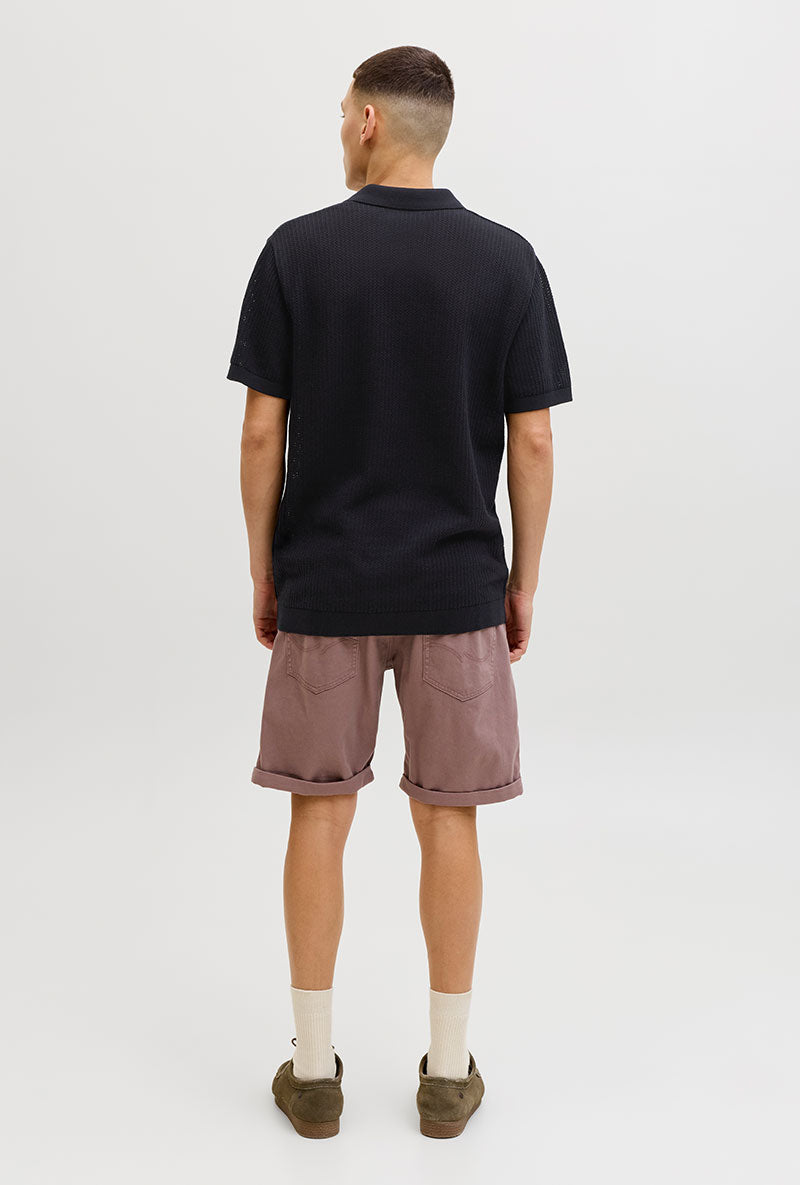 Back image of a model wearing Jess knit polo in black, by brand Jack&jones
