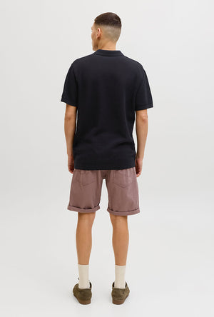 Back image of a model wearing the Jess knit polo in black, by brand Jack&jones