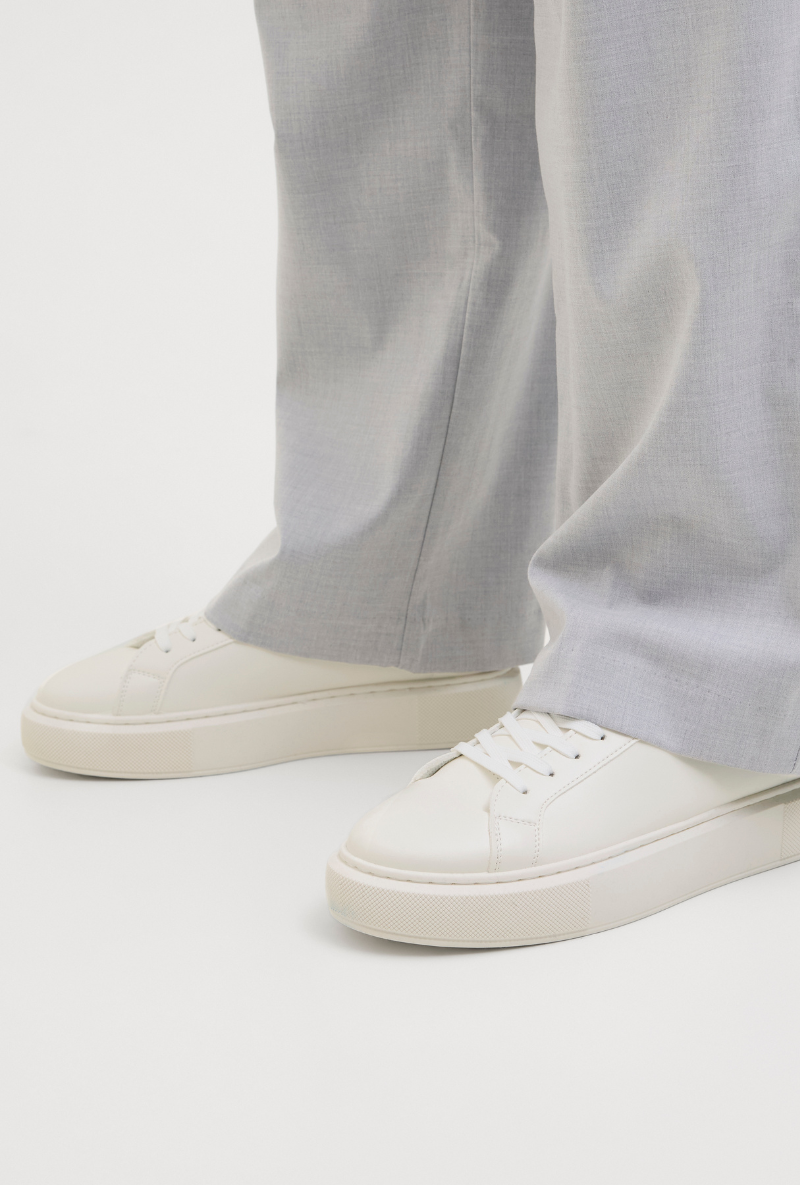 Front image of a model wearing Jack and jones aspire cupsole sneaker in white, by brand Jack&jones