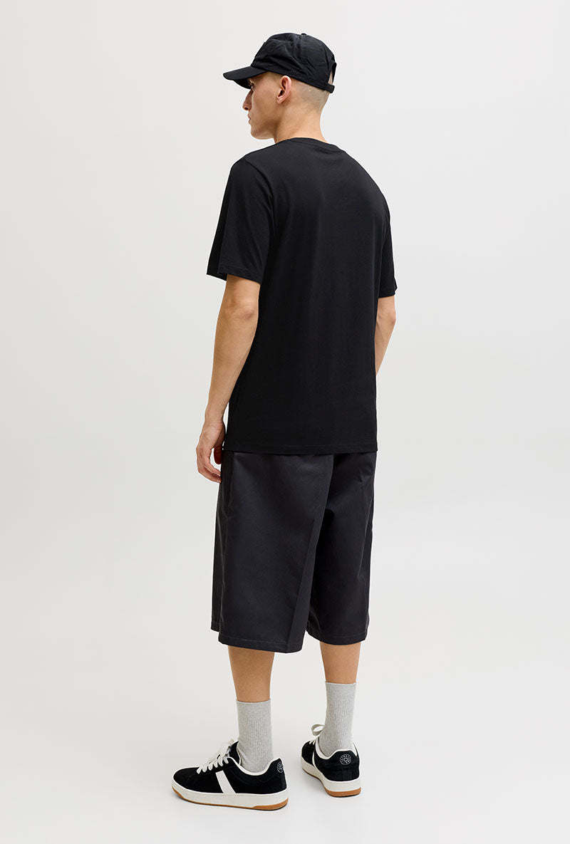 Back image of a model wearing Indiana tee ss crew neck in black, by brand Jack&jones