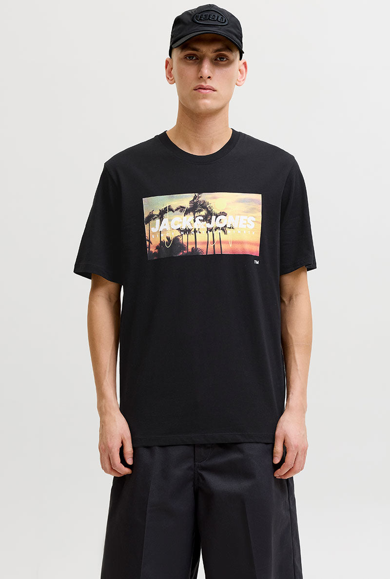 Front image of a model wearing Indiana tee ss crew neck in black, by brand Jack&jones
