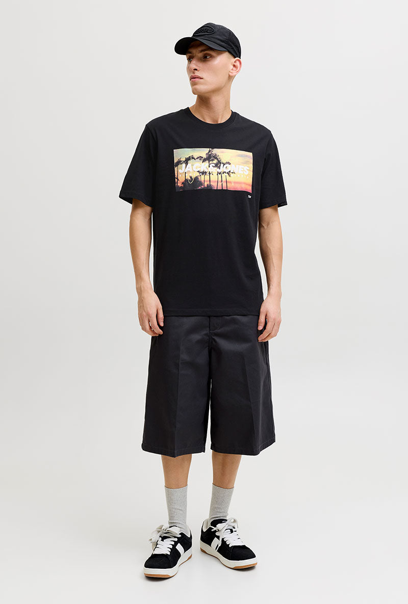 Front image of a model wearing Indiana tee ss crew neck in black, by brand Jack&jones