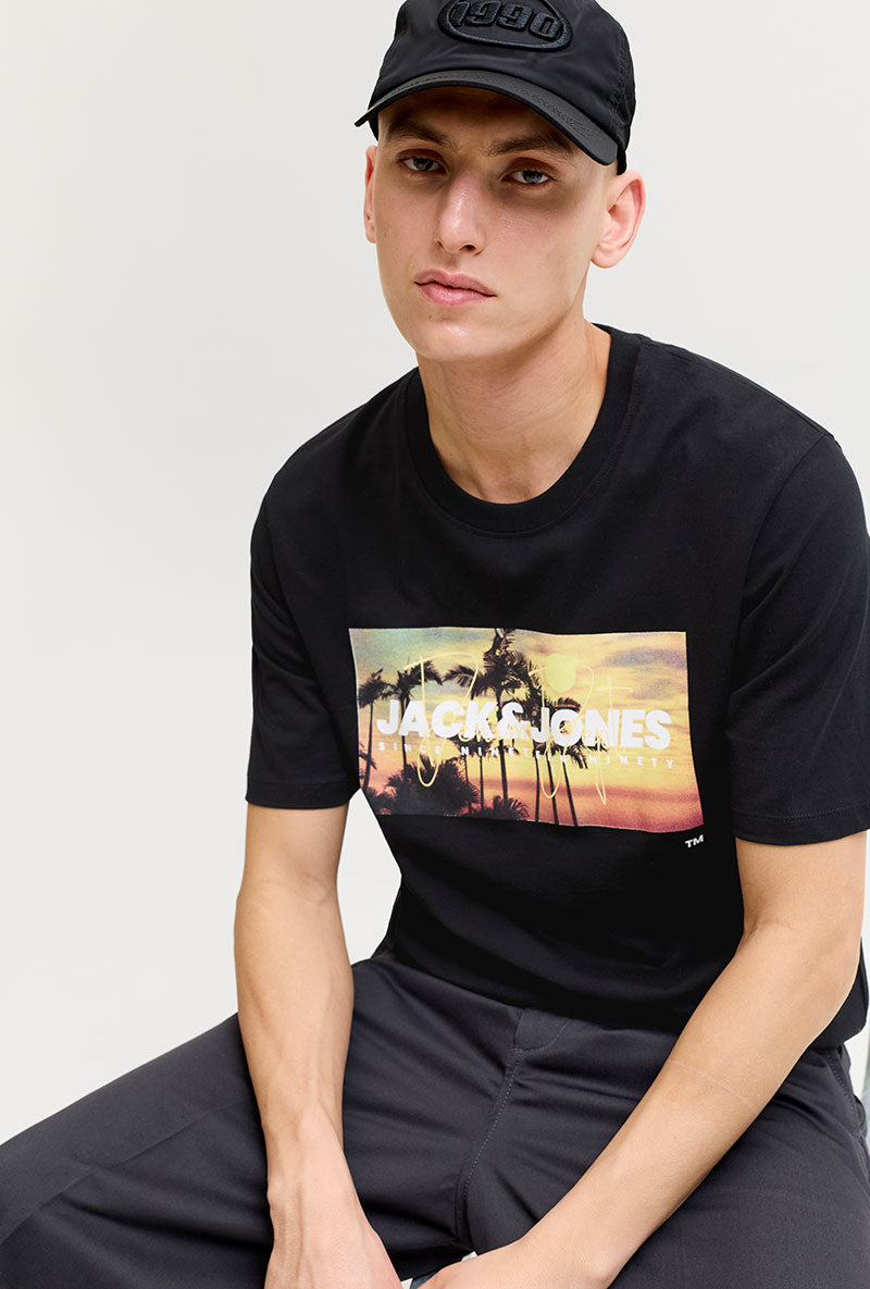 Front image of a model wearing Indiana tee ss crew neck in black, by brand Jack&jones
